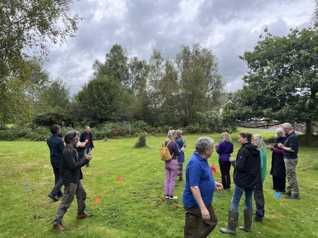 12 trainees putting their new dowsing skills into practice at Mossdale Village Hall