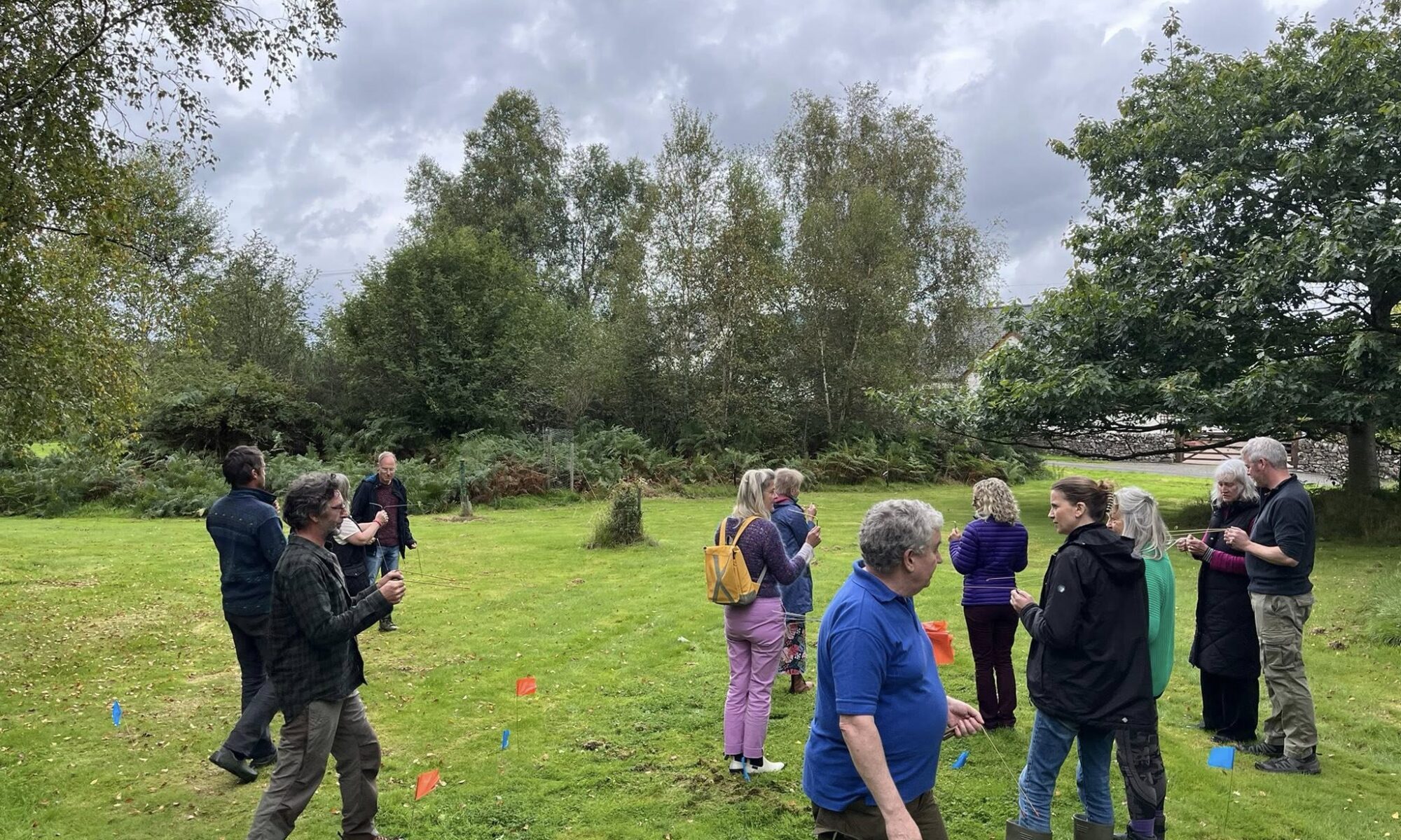 12 trainees putting their new dowsing skills into practice at Mossdale Village Hall